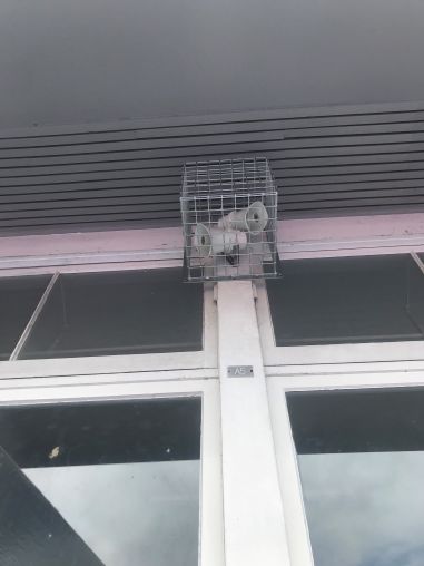 Caged outdoor speakers.jpg